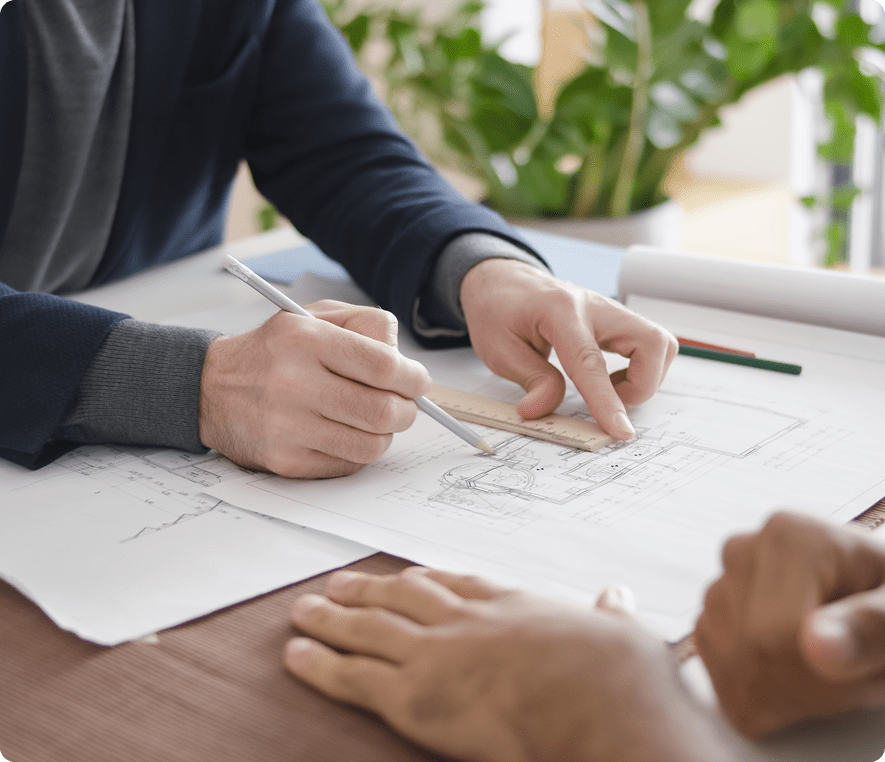 Architects discussing building plans
