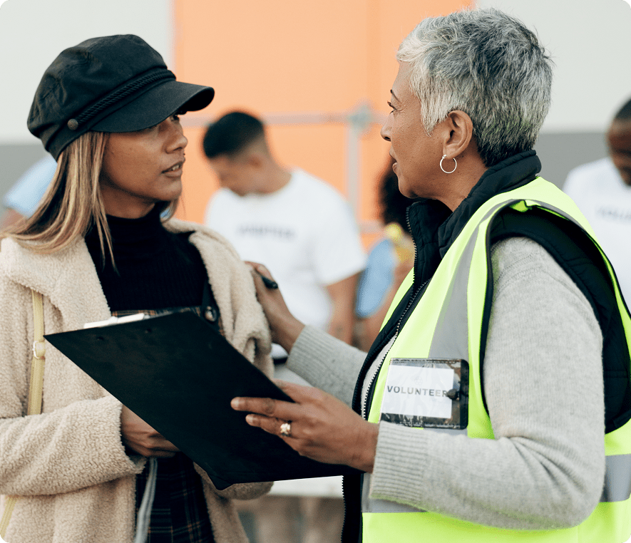 Volunteer coordinator discussing with a participant